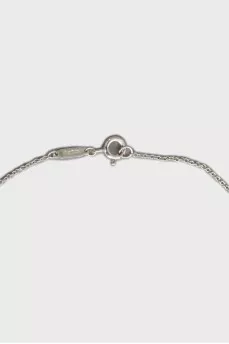 Silver pendant with round diamond