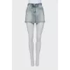 Denim mini skirt with raw edge