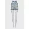 Denim mini skirt with raw edge
