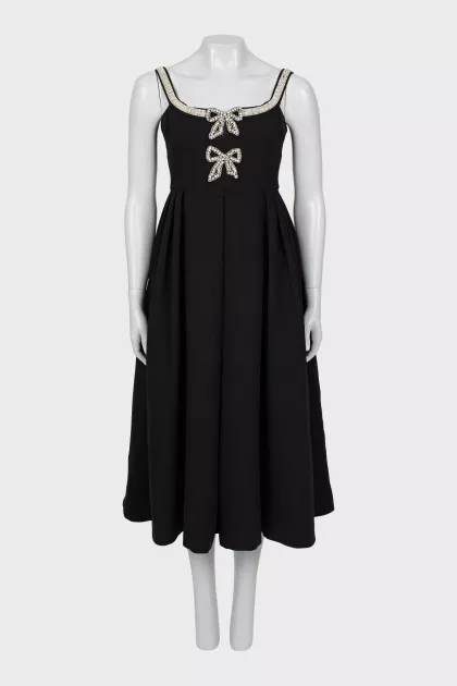 Dress decorated with rhinestones on straps