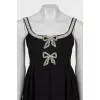 Dress decorated with rhinestones on straps