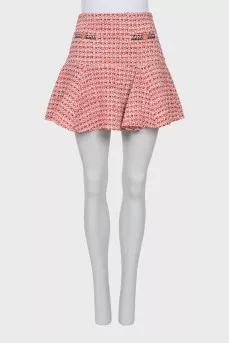 Tweed skirt decorated with buttons
