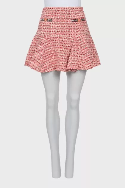 Tweed skirt decorated with buttons