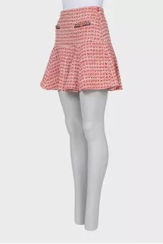 Tweed skirt decorated with buttons