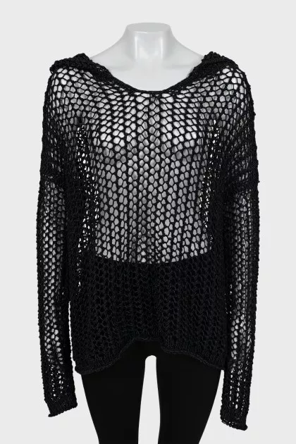 Knitted sweater with a hood