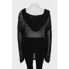 Knitted sweater with a hood