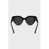 Sunglasses with gold logo on temples