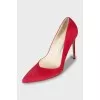 Red stiletto pumps