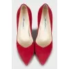 Red stiletto pumps