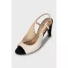 Sandals with textile heels and tag