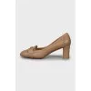 Brown leather shoes with decor