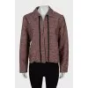 Jacket decorated with beads