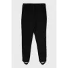 Tapered trousers with stirrups