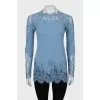 Blue blouse decorated with lace