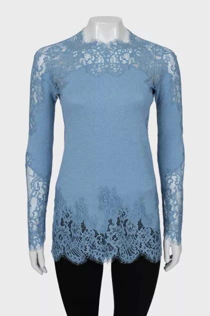 Blue blouse decorated with lace