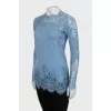 Blue blouse decorated with lace