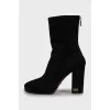 Suede ankle boots with logo on the heel