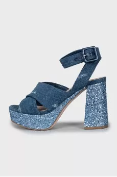 Denim sandals with a figured heel