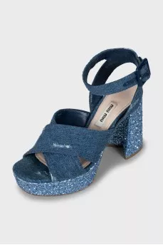 Denim sandals with a figured heel
