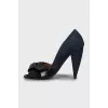 Suede shoes with a figured heel