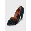 Suede shoes with a figured heel