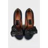 Suede shoes with a figured heel