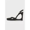 Patent leather shoes with a figured wedge heel