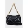 Quilted bag with embossed logo