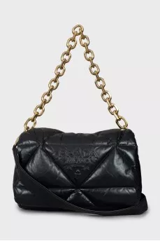 Quilted bag with embossed logo