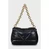 Quilted bag with embossed logo
