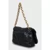 Quilted bag with embossed logo