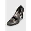 Silver embossed shoes
