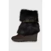 Insulated boots with high wedge heels