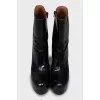 Black patent leather ankle boots