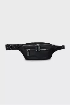 Belt bag decorated with spikes