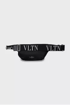 Belt bag decorated with spikes