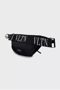 Belt bag decorated with spikes