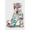 Leather ankle boots with print