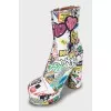 Leather ankle boots with print
