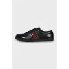 Leather sneakers with patent leather inserts