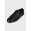 Leather sneakers with patent leather inserts