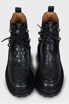 Leather boots with quilted insert