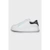 Black and white leather sneakers
