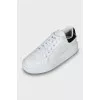 Black and white leather sneakers