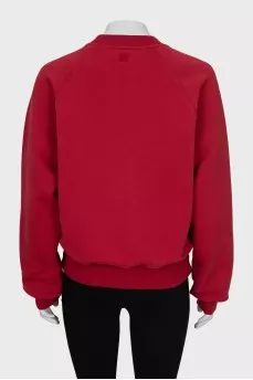Red sweatshirt with text print