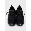 Textile sneakers with leather inserts
