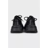 Textile sneakers with leather inserts