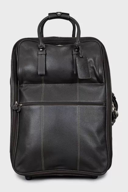 Leather suitcase with contrasting seams