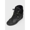 Black leather lace-up sneakers