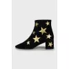 Suede ankle boots with golden stars